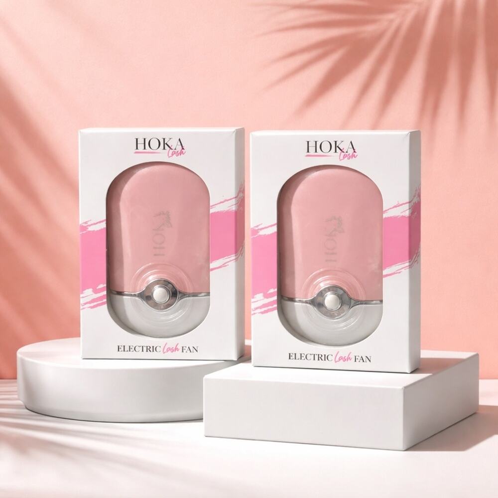 2 Hoka Lash Fan in Soft Pink. Ideal for quick drying. Sleek pink design.